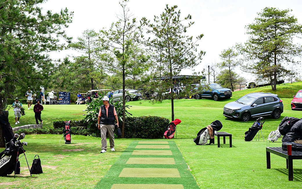 Golfers on artificial grass driving range in Omaha, NE