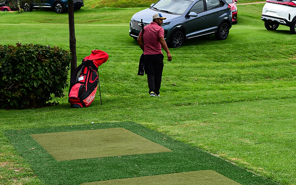 Golfer on artificial grass driving range in Omaha NE