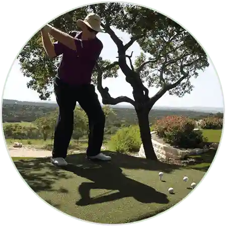 Golfer practicing on artificial golf turf in Omaha, NE from Eagle Eye Turf