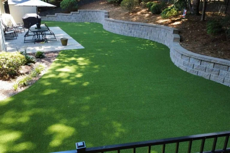 Backyard artificial grass installation in Omaha, NE from Eagle Eye Turf