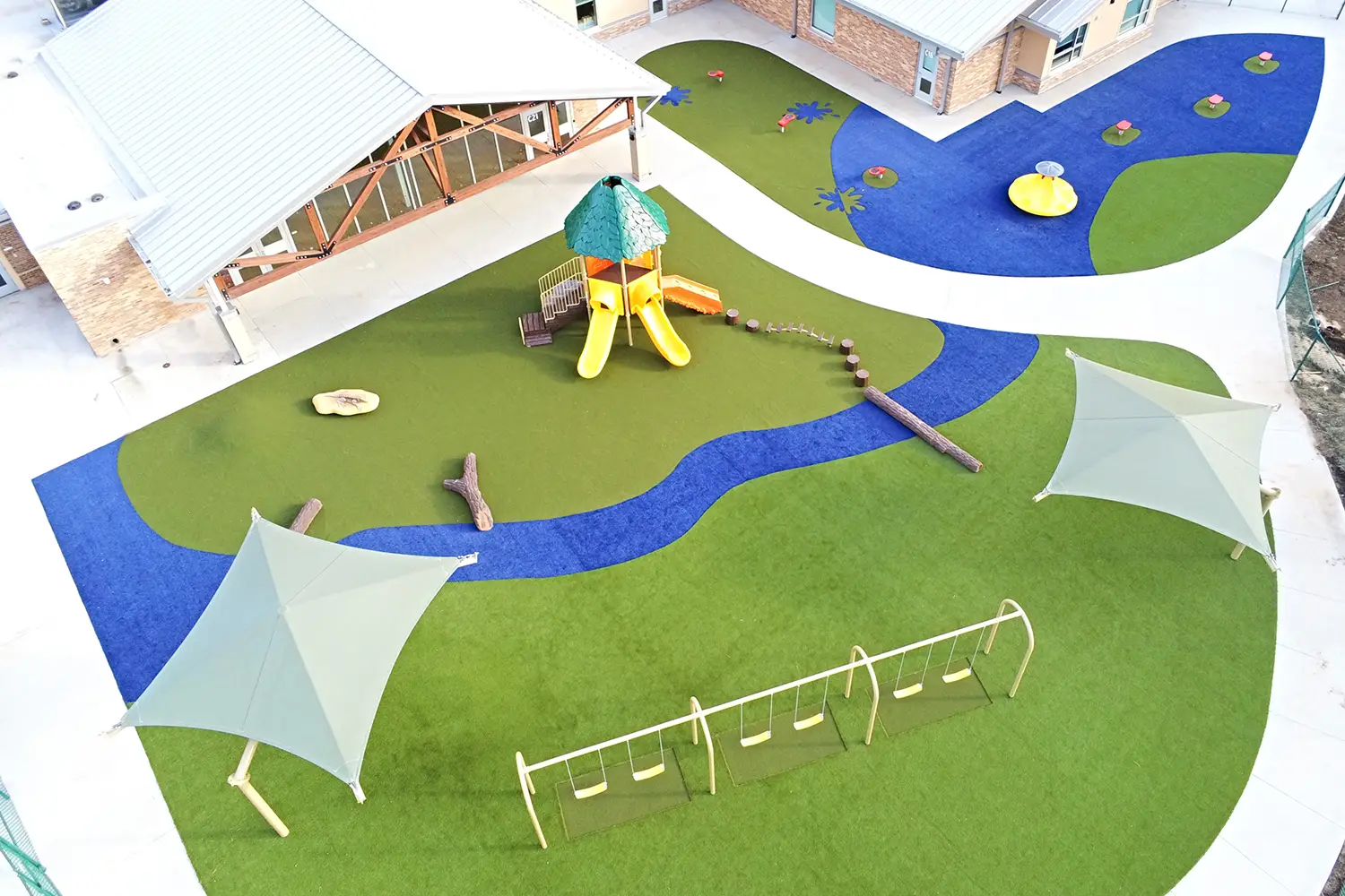Artificial grass playground installed by Eagle Eye Turf